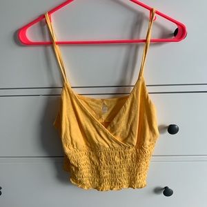 yellow tank top